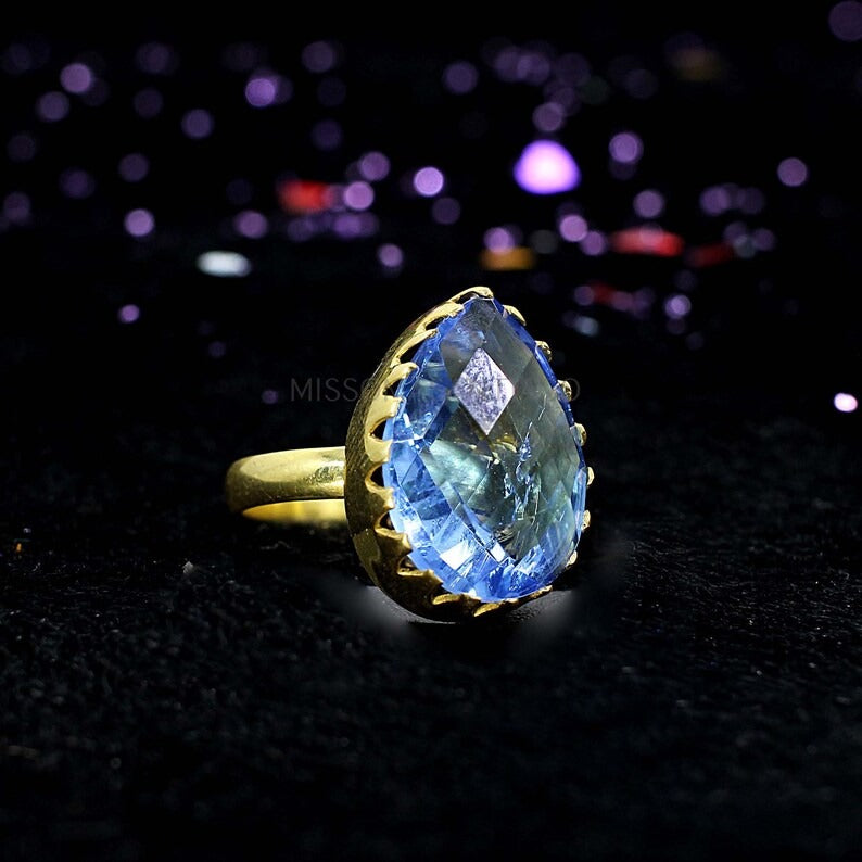 Sky Blue Topaz Gold Plated Brass Ring